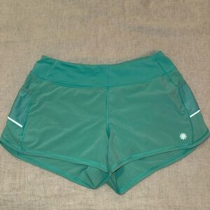 ATHLETA - teal running shorts